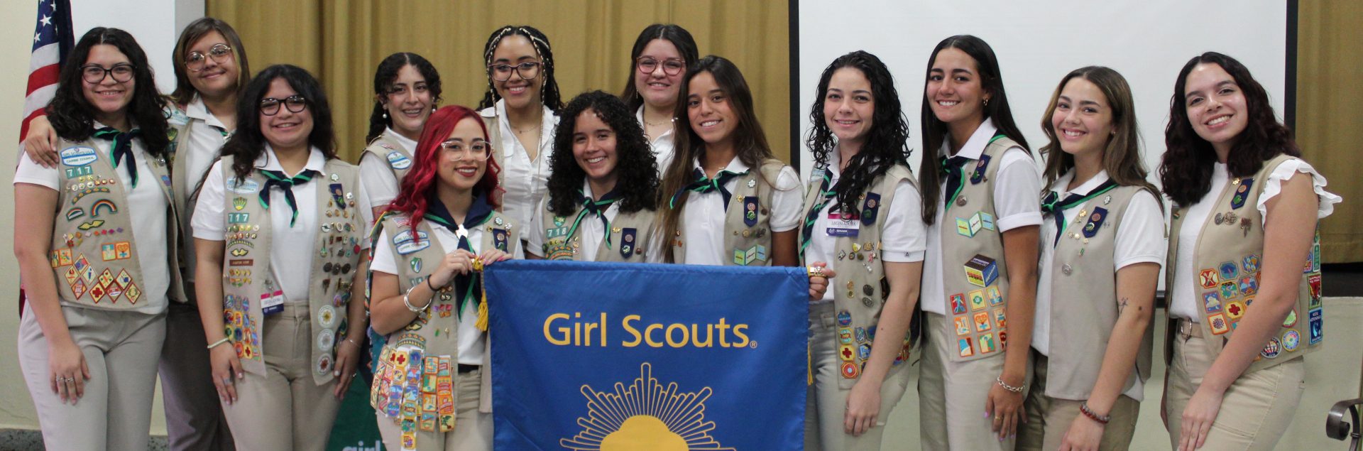  high school gold award girl scout with natural hair wearing ambassador vest 